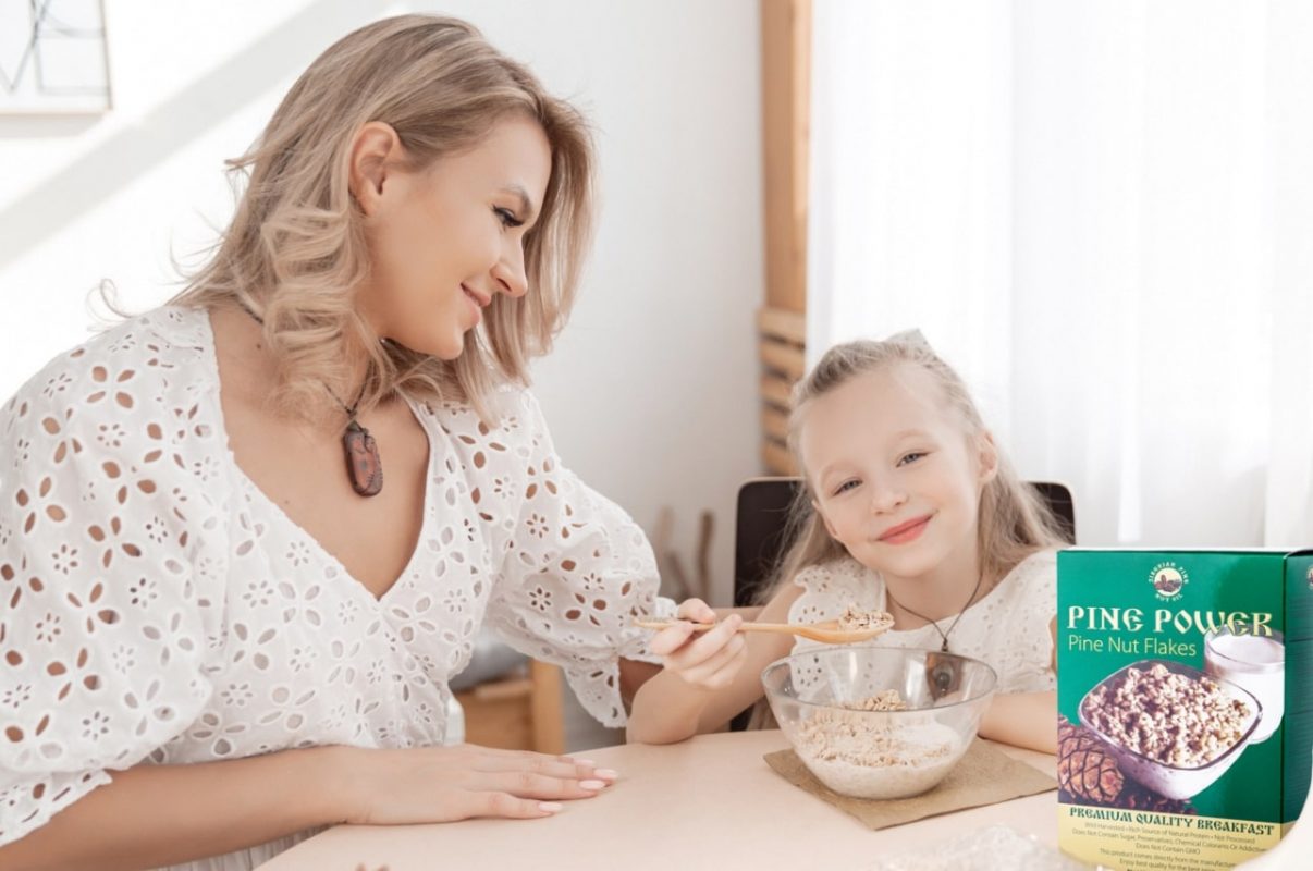 Why should pine nut flakes be included in children's diets?