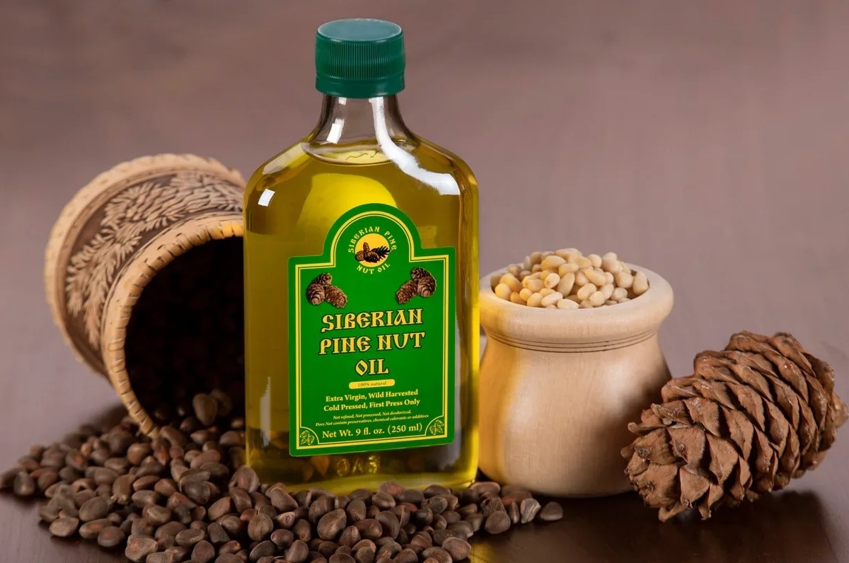 How does consuming pine nut oil trigger the body's self-healing?