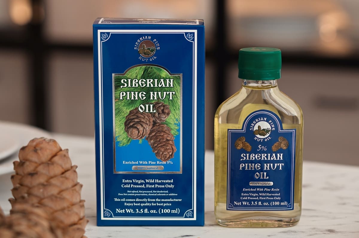 Pine nut oil enriched with pine resin for scars and keloids