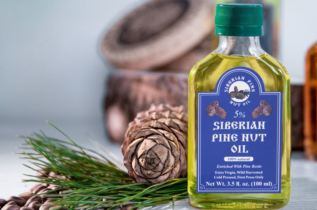 Pine nut oil enriched with pine resin for fungal infections of the nails and skin